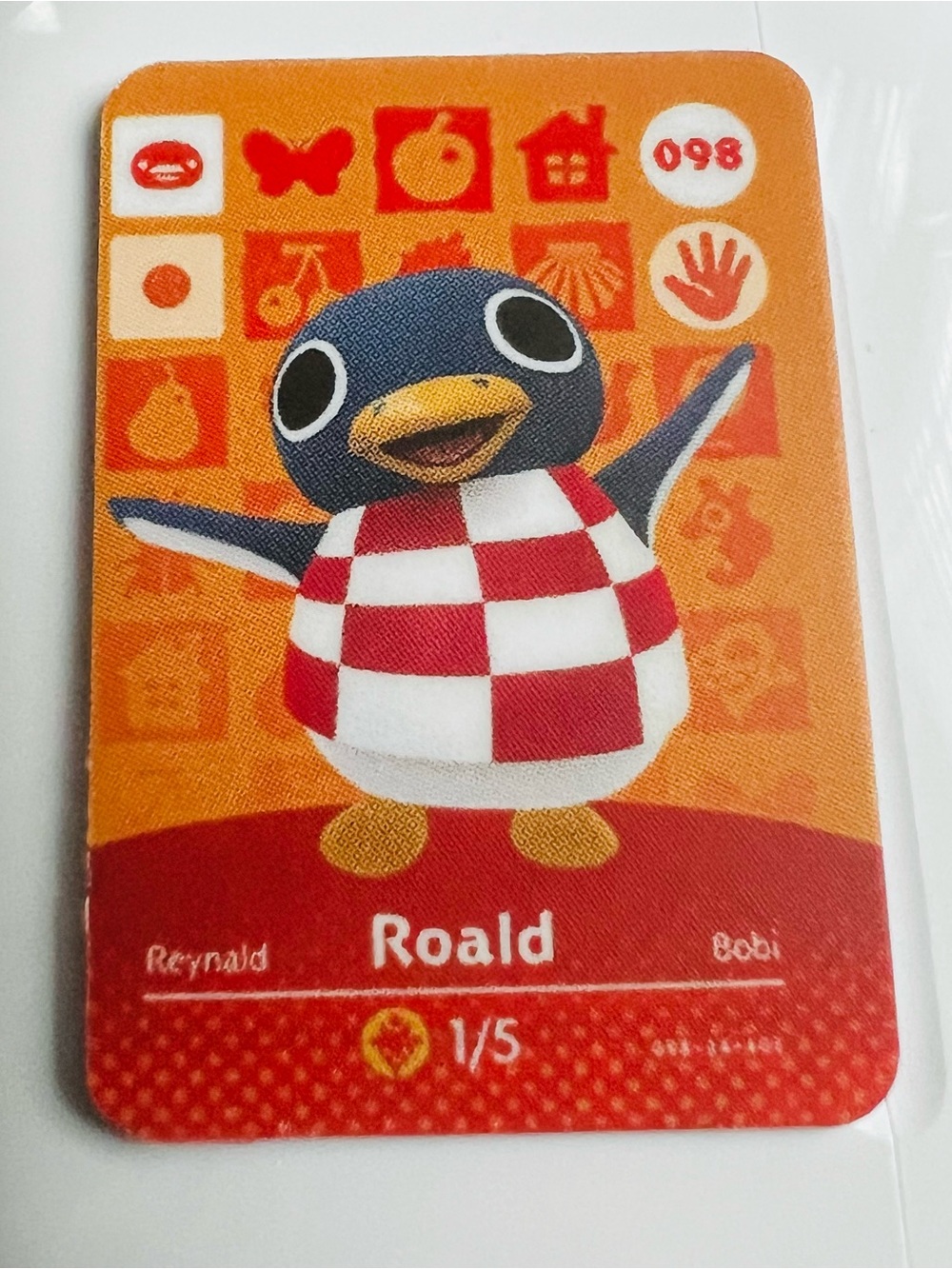 Roald Penguin Amiibo Trading Card - Orange Background, Red & White Check Shirt